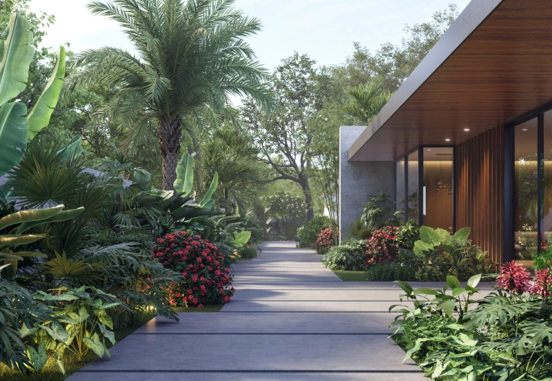 Modern house entrance with lush garden and stone pathway.